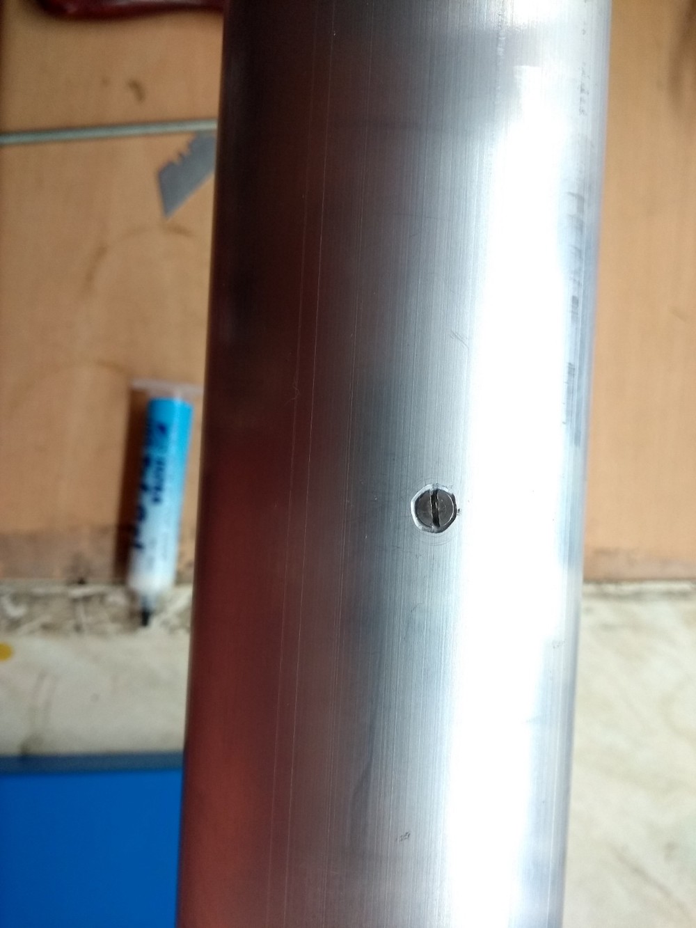 Bung screwed in with 3 M3 CSK machine screws